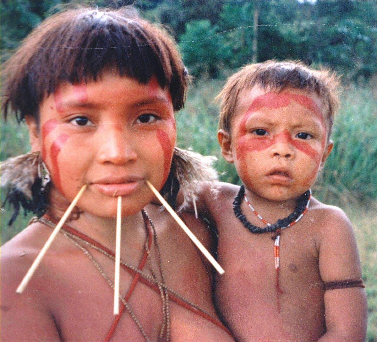 A Yanomami woman and child in the Amazon